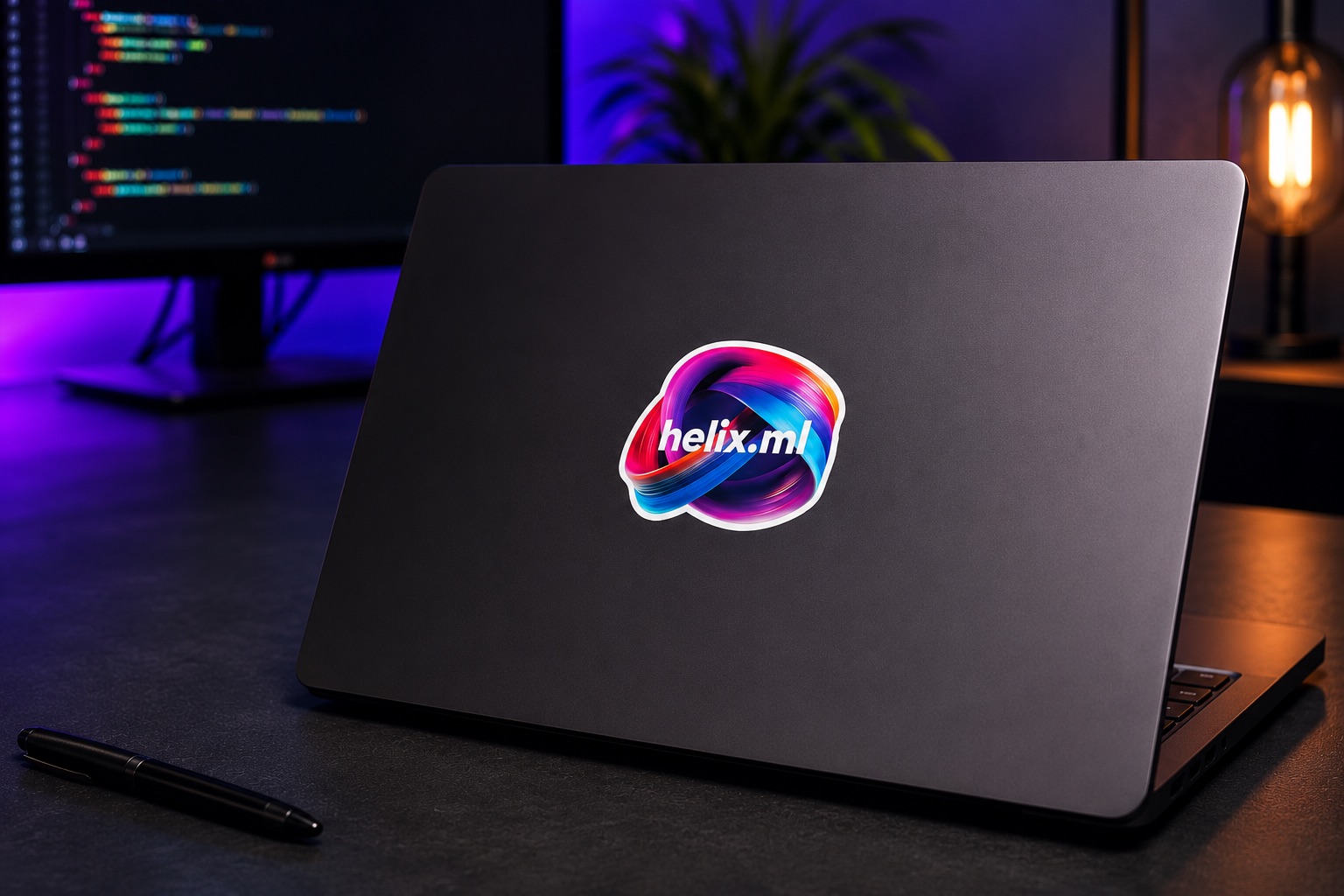 Laptop with a helix.ml sticker on a developer's desk, code on the monitor behind it